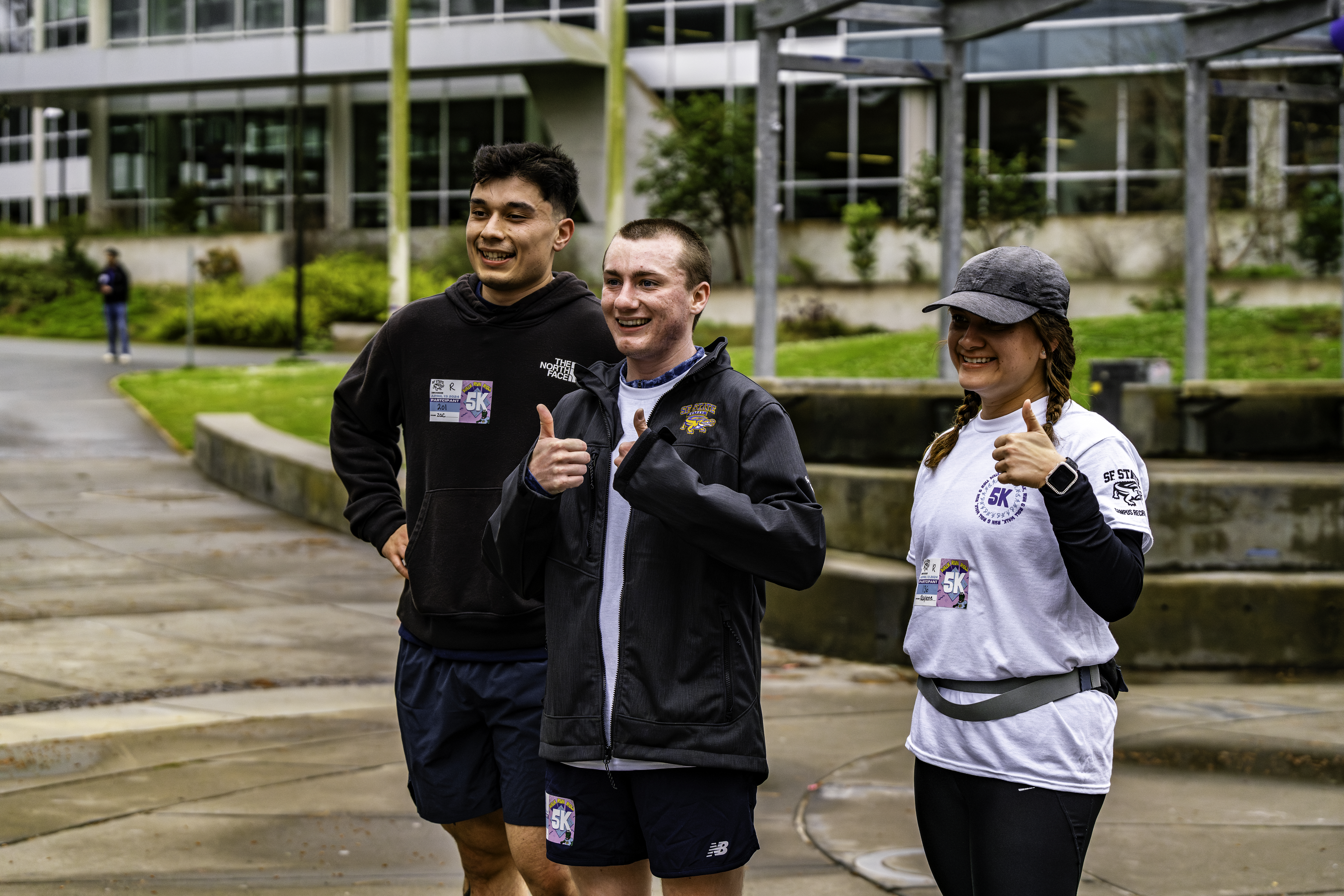 Top 3 Runners of 2024 5K Run, Walk, and Roll pose for a photo