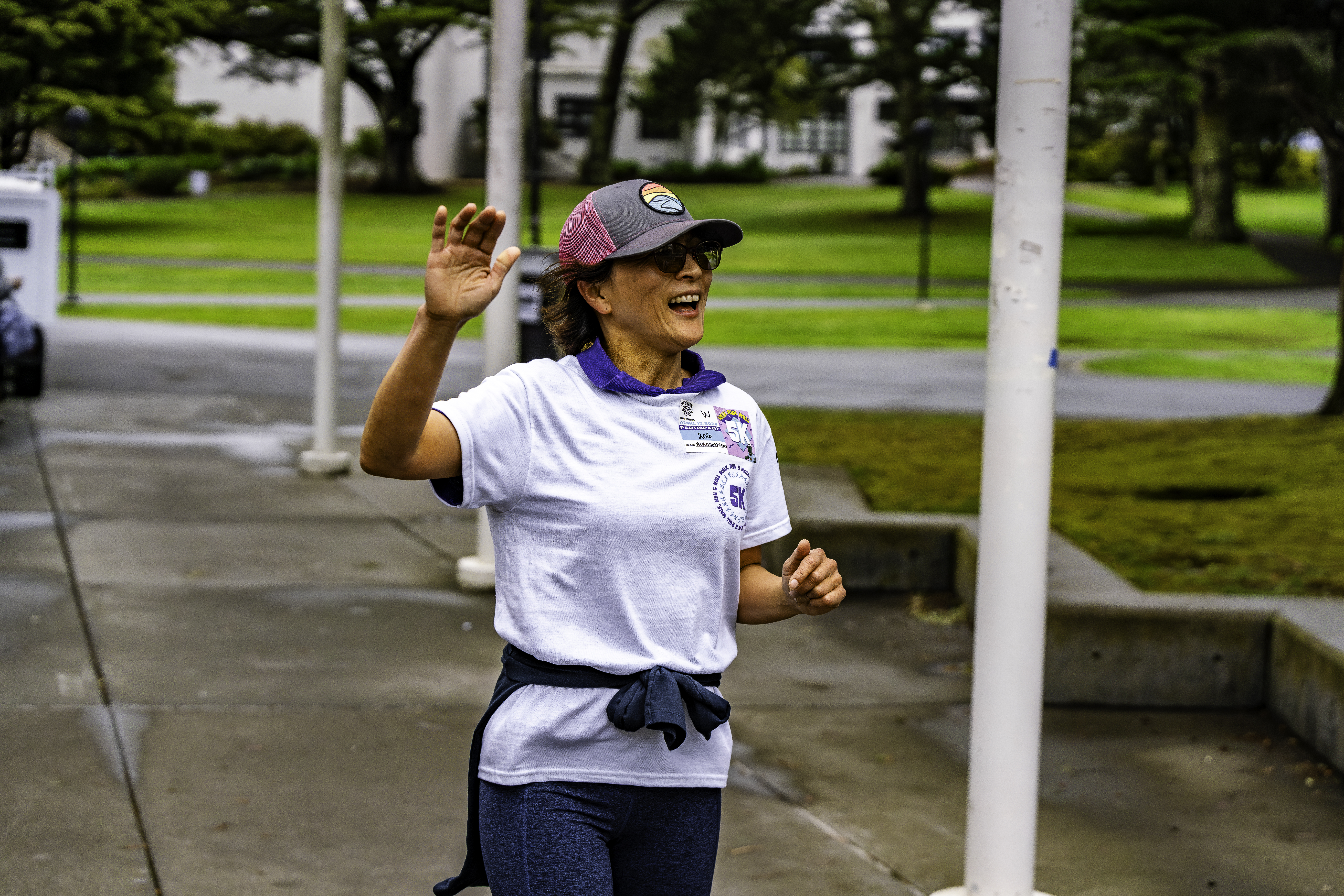 Participant goes for High-Five at Annual 5K