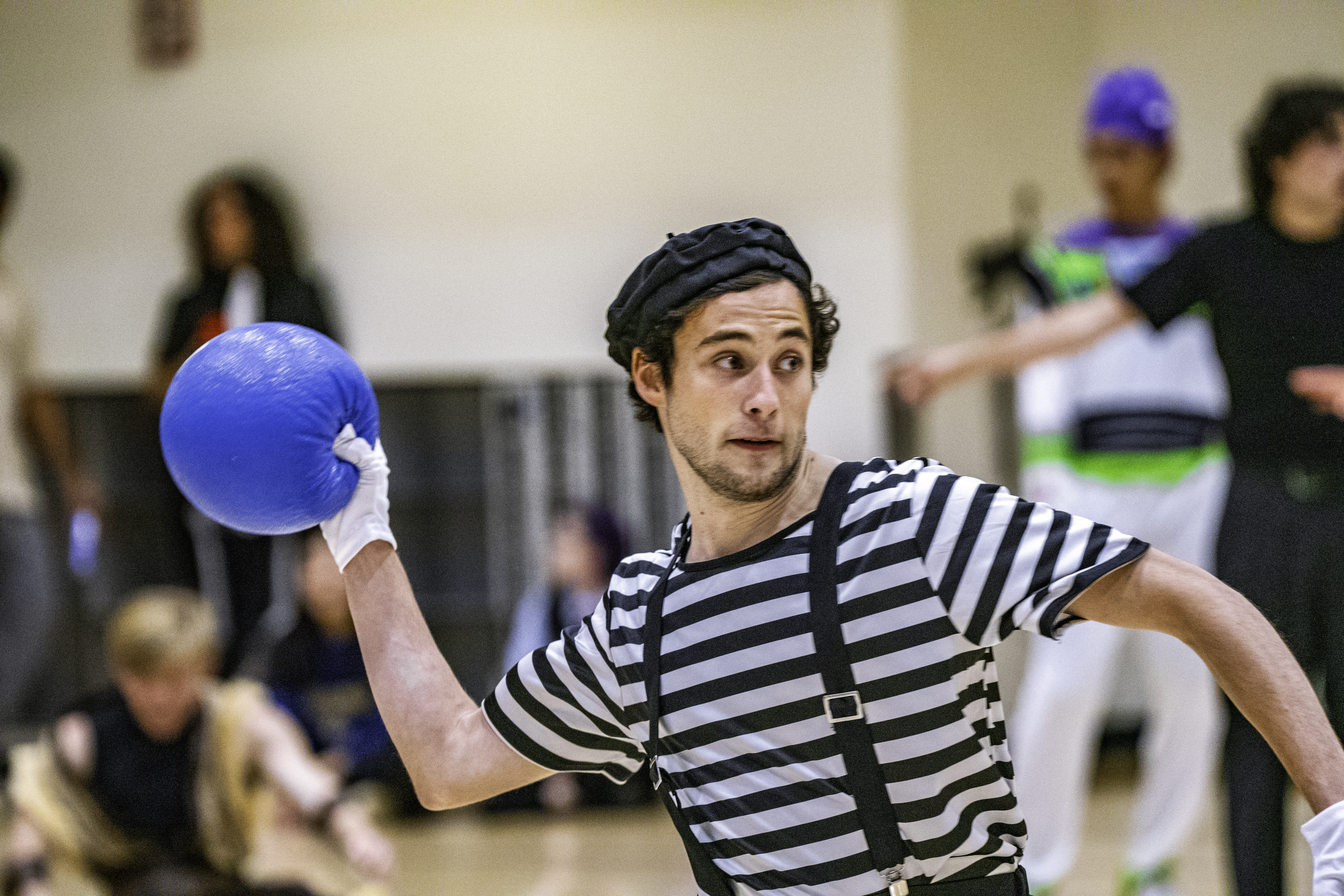 Student throws dodgeball at Costume Dodgeball