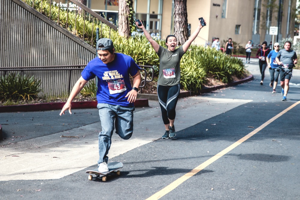 Excited Participant Running in the 5K