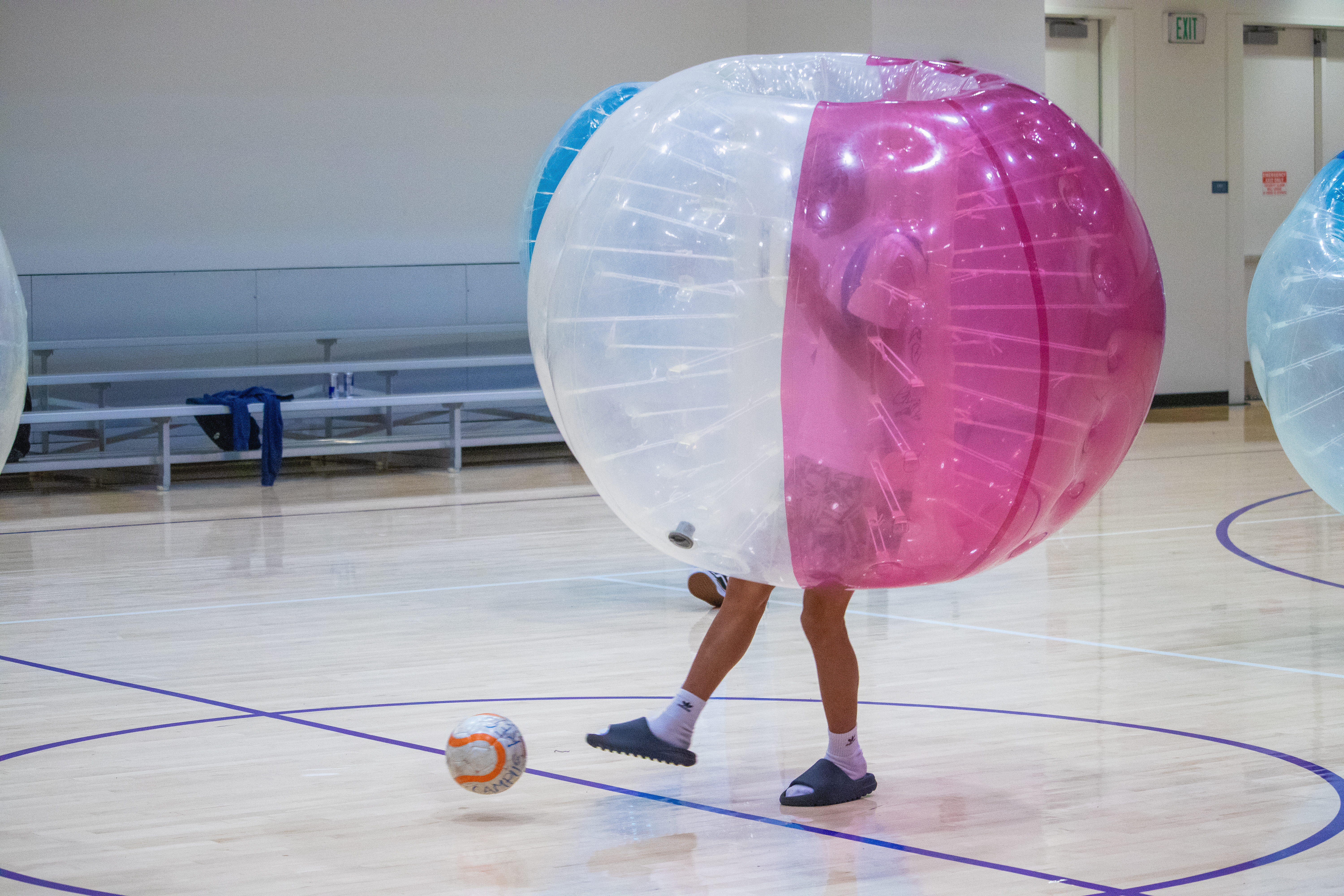 SFSU student participating in bubble soccer at rec the night
