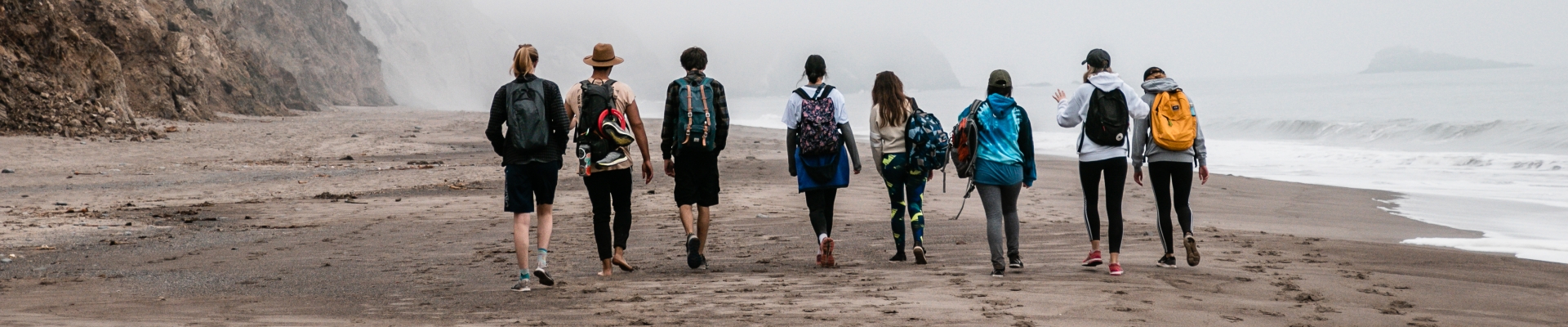 Students walking on the beach