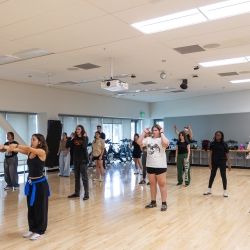 Photo of group of members taking Beginner Hip Hop Group Fitness Class.