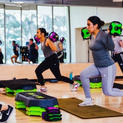 people lifting weights for exercise