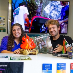 Two individuals working inside of the Outdoor Resource Center.